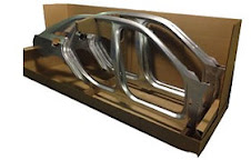Automotive body frame packed in a corrugated container