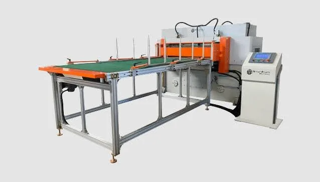 Smartpress foam press with an orange frame and green conveyor belt